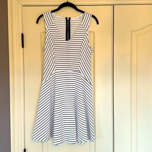 Lush B&W stripe mini dress. Flattering cut, flare bottom